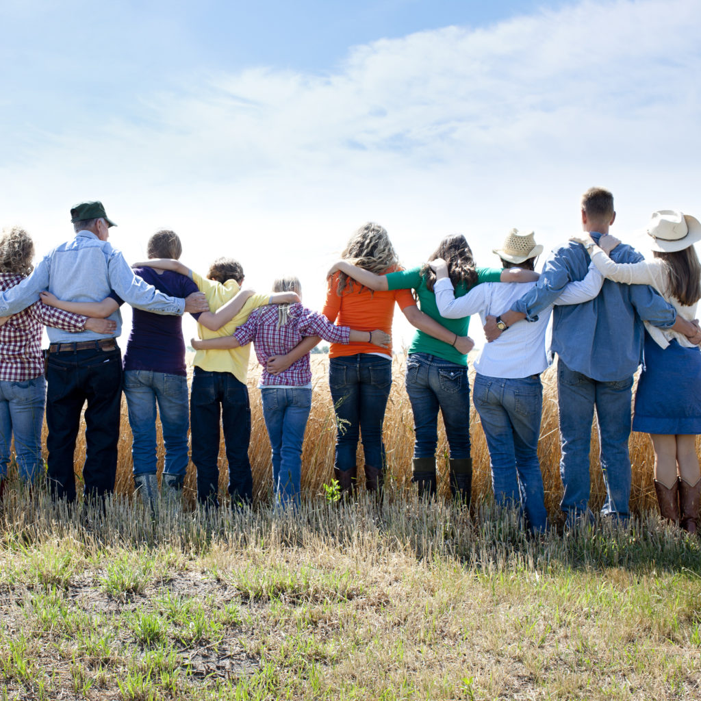 People with arms around in other in support